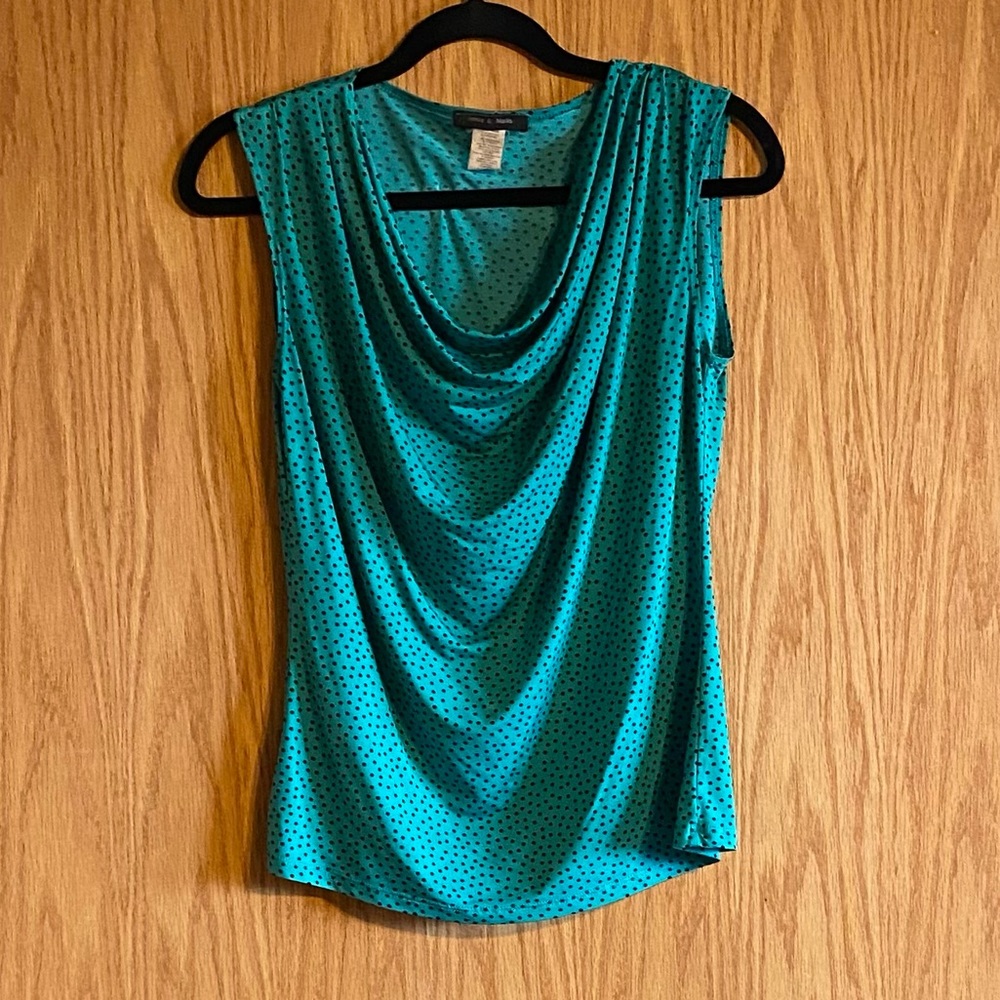 Green dress shirt. Very nice material. Smoke free home.